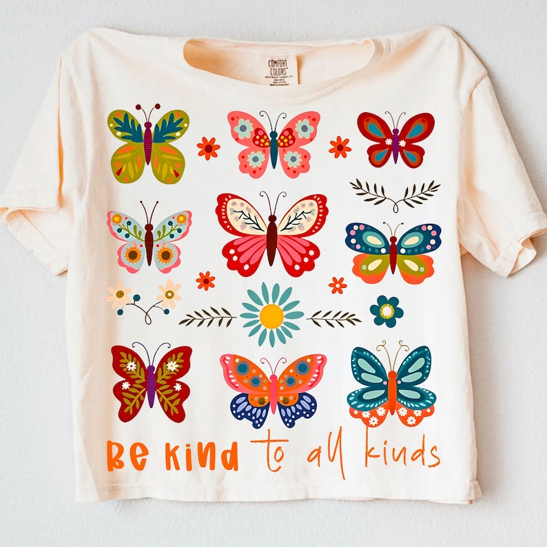 Boho 'Be Kind to All Kinds' butterfly and wildflower PNG design on a white background.