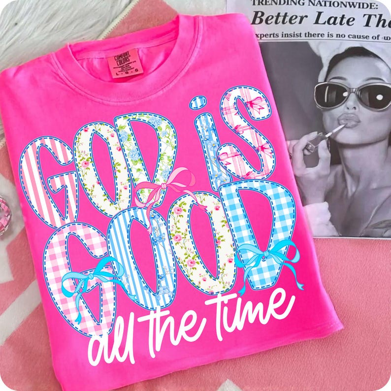 A close-up mockup of a white t-shirt featuring the 'God Is Good All The Time' preppy boho Christian PNG design.