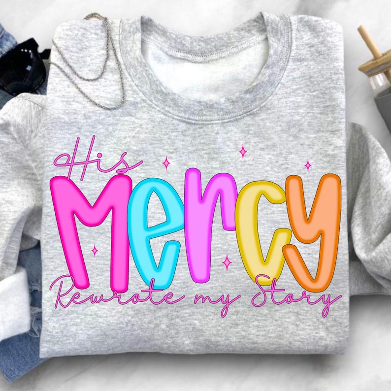 His Mercy Rewrote My Story Floral Christian PNG Design on a T-Shirt mockup