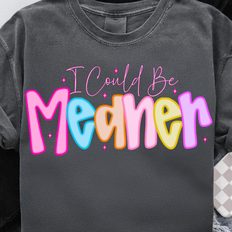 "I Could Be Meaner" PNG design on a white t-shirt mockup, showcasing sarcastic humor.