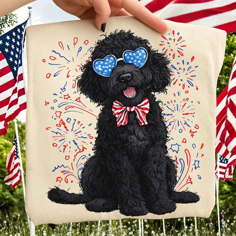 Patriotic Goldendoodle wearing star sunglasses and a red, white, and blue bow, with firework accents, perfect for 4th of July designs.