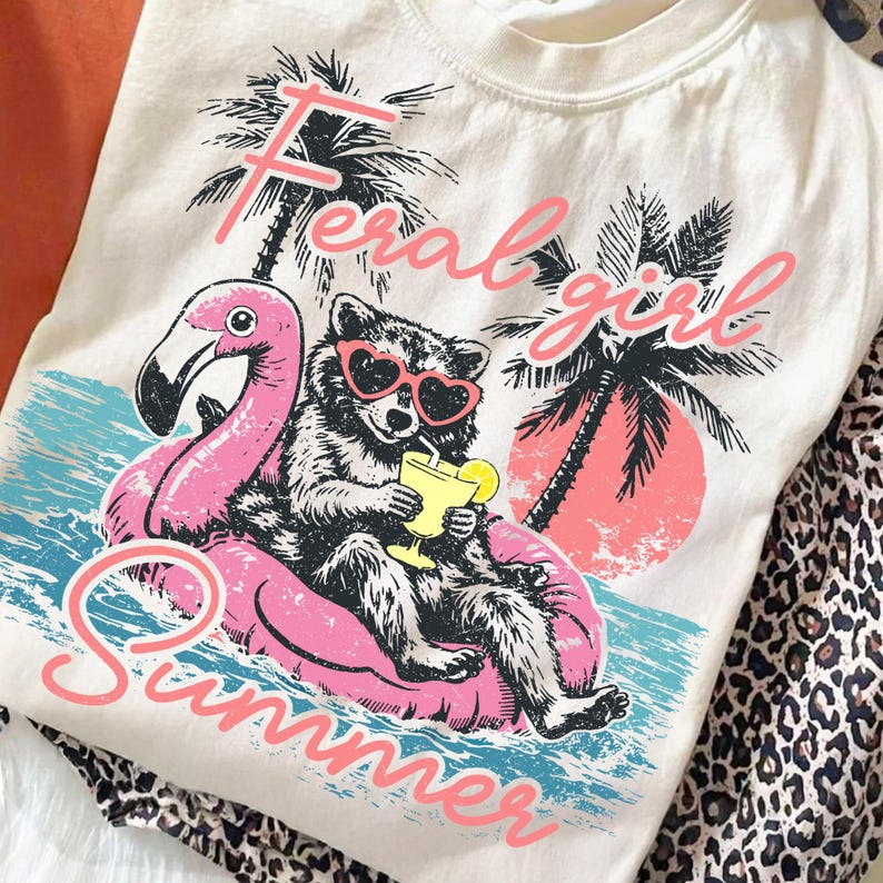 Feral Girl Summer Raccoon PNG on pink flamingo floatie with margarita, perfect for beach vacation shirts