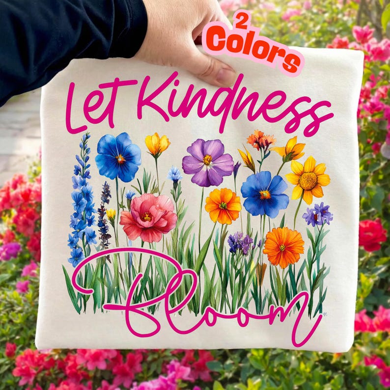 Let Kindness Bloom wildflower sublimation design on a rustic wooden background, showcasing vibrant boho floral graphics perfect for spring apparel.