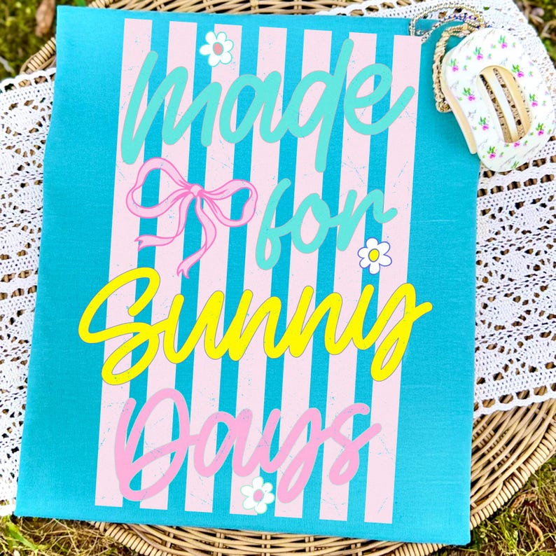 Coastal Coquette Retro Summer PNG design on a white t-shirt mockup, featuring a pink bow and pastel stripes.