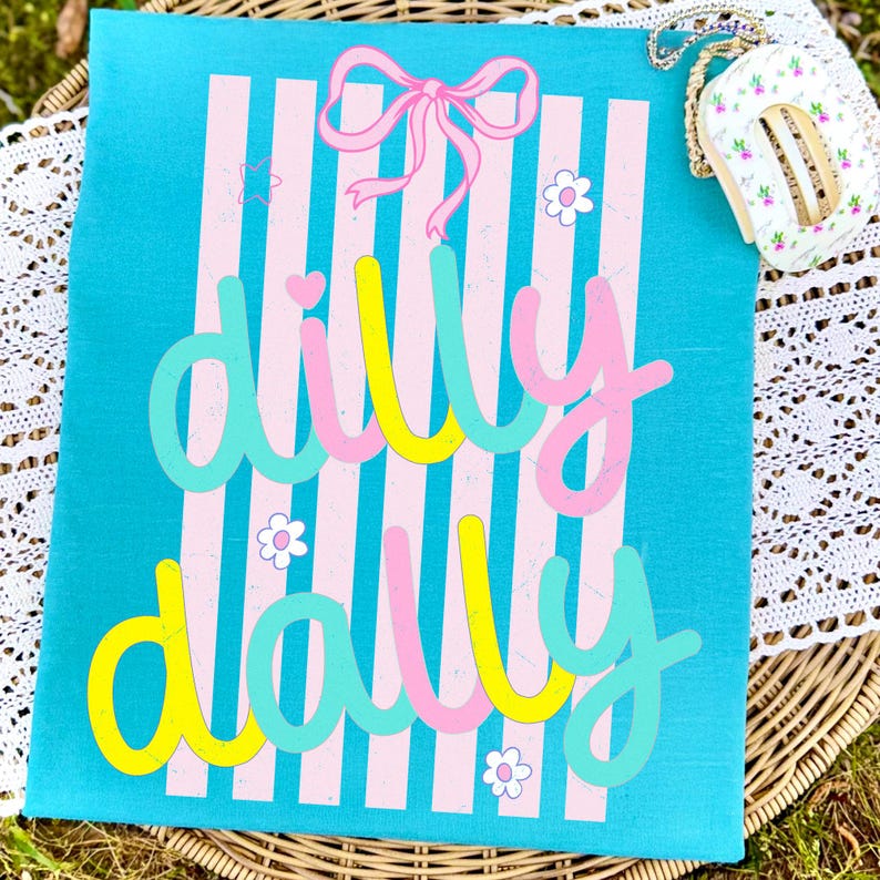 Dilly Dally Preppy Bow Sublimation Design featuring pastel stripes and retro hand-drawn text