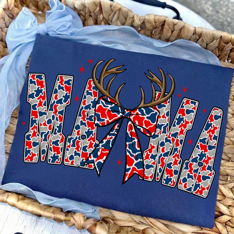 Retro Camo Mama PNG design featuring deer antlers with a coquette bow in patriotic red, white, and blue colors.
