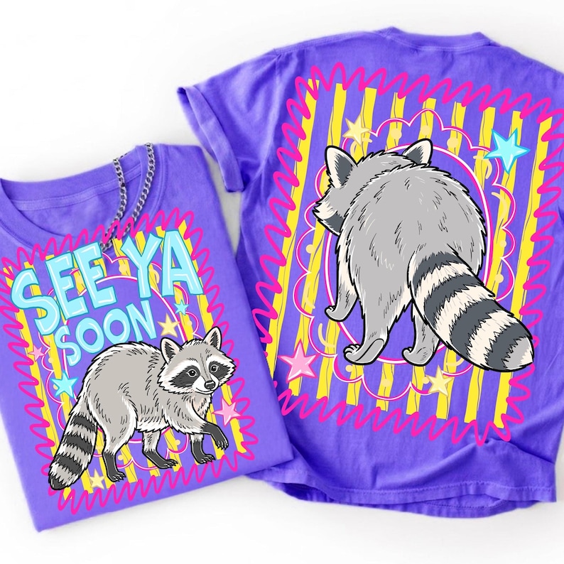 A playful "See Ya Soon Raccoon" digital design with vibrant pink and yellow stripes, showcasing a detailed front view.