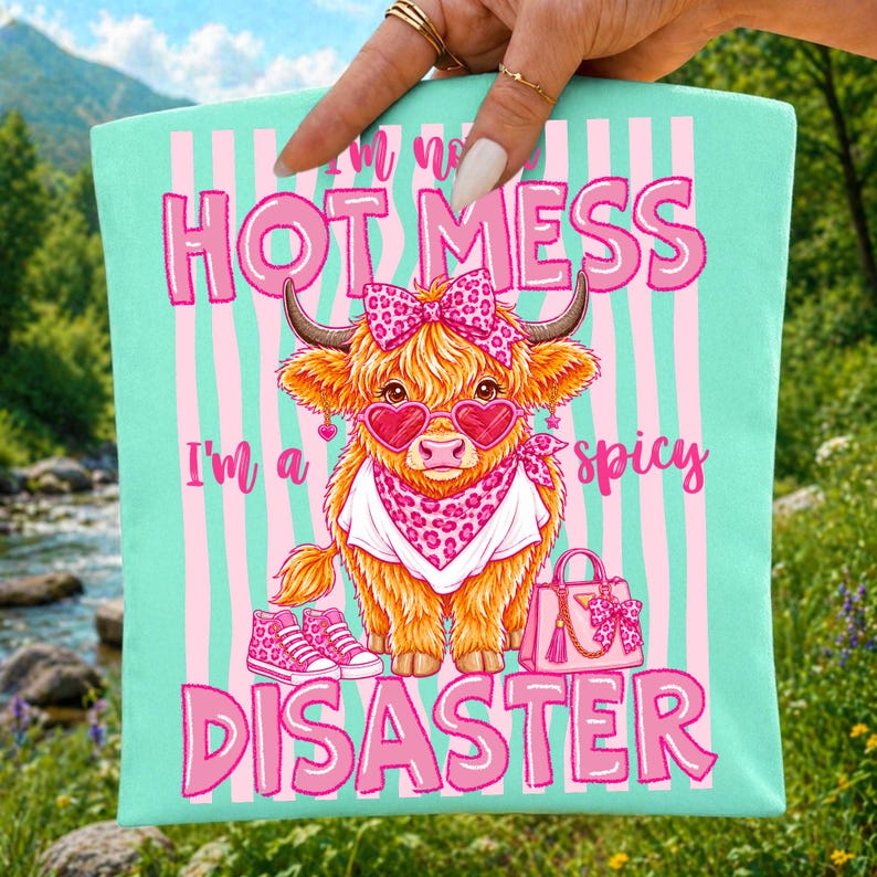 Spicy Disaster Highland Cow PNG Sublimation Design on a T-Shirt