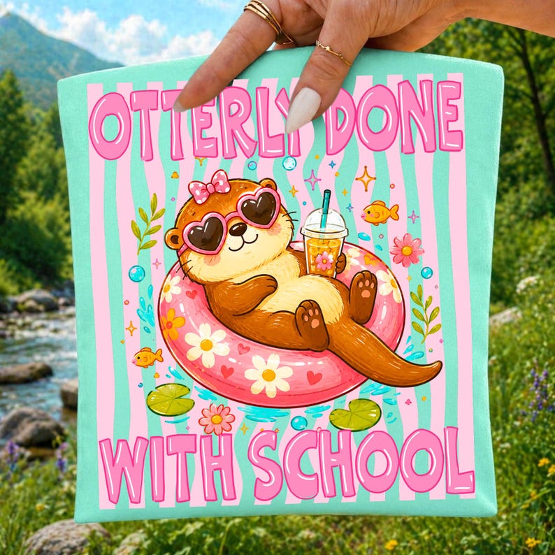 "Otterly Done With School" PNG design on a white t-shirt, featuring a cute Kawaii otter with pink and purple wavy background, perfect for summer break celebrations.