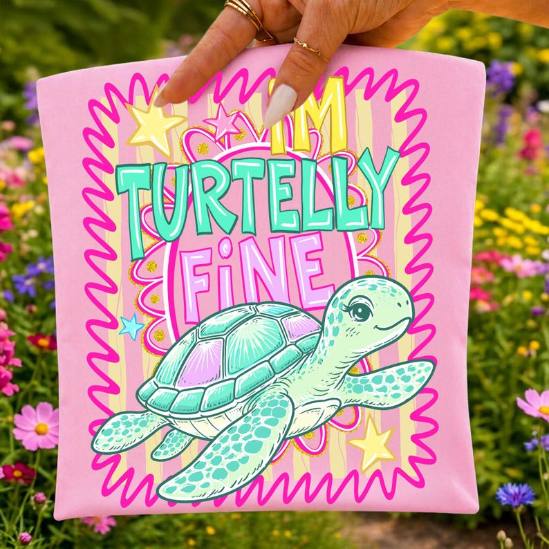 I'm Turtelly Fine PNG design on a white t-shirt, featuring a hand-drawn sea turtle with a preppy striped border.