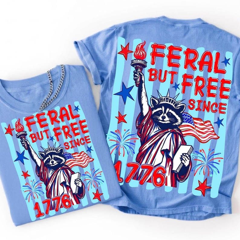 Feral But Free funny raccoon retro 4th of July PNG t-shirt design on a distressed white background
