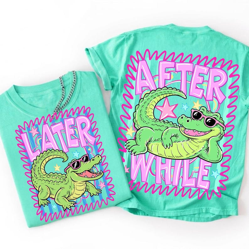 Preppy Later Gator PNG design displayed on a white t-shirt, featuring a retro striped alligator with sunglasses and a vibrant summer aesthetic.