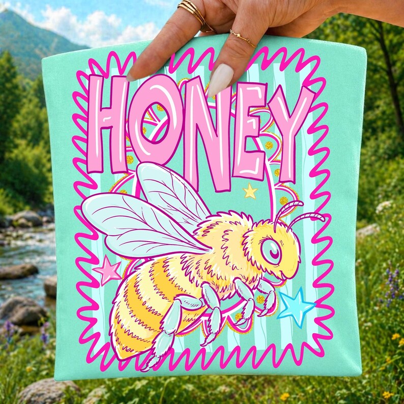 Retro Bee Honey PNG sublimation design on a t-shirt, featuring a striped bee and 'Be Kind' message, perfect for teacher apparel.