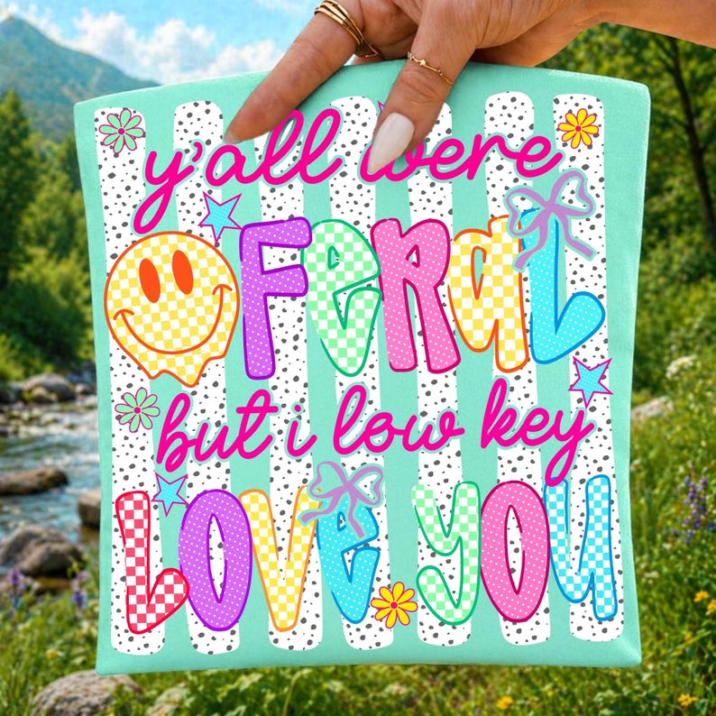 Y'all Were Feral PNG sublimation design featuring a vibrant rainbow and retro coquette style.