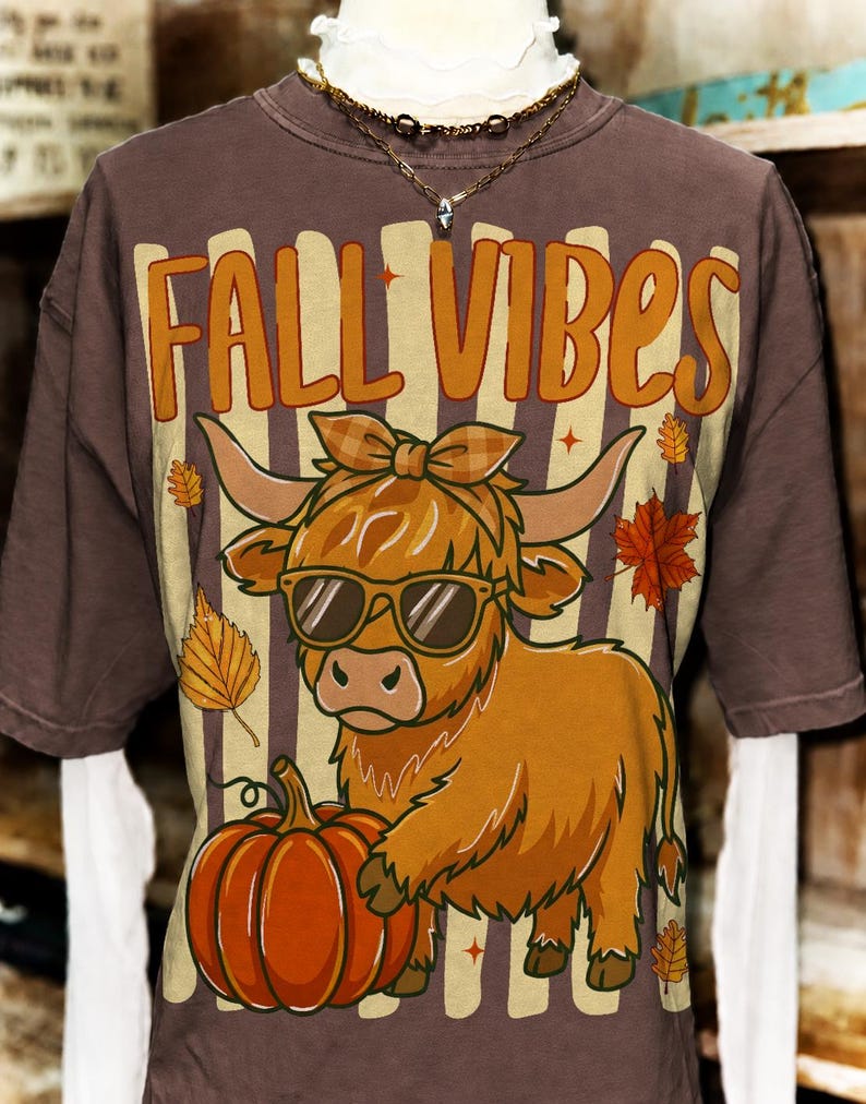 Close-up of the Retro Highland Cow Fall PNG Sublimation Design featuring a Western cowgirl with a pumpkin and "Howdy Fall" text.