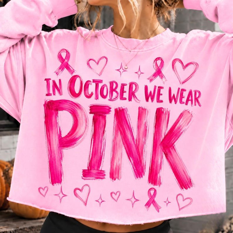 Close up of pink ribbon breast cancer awareness design on a t-shirt