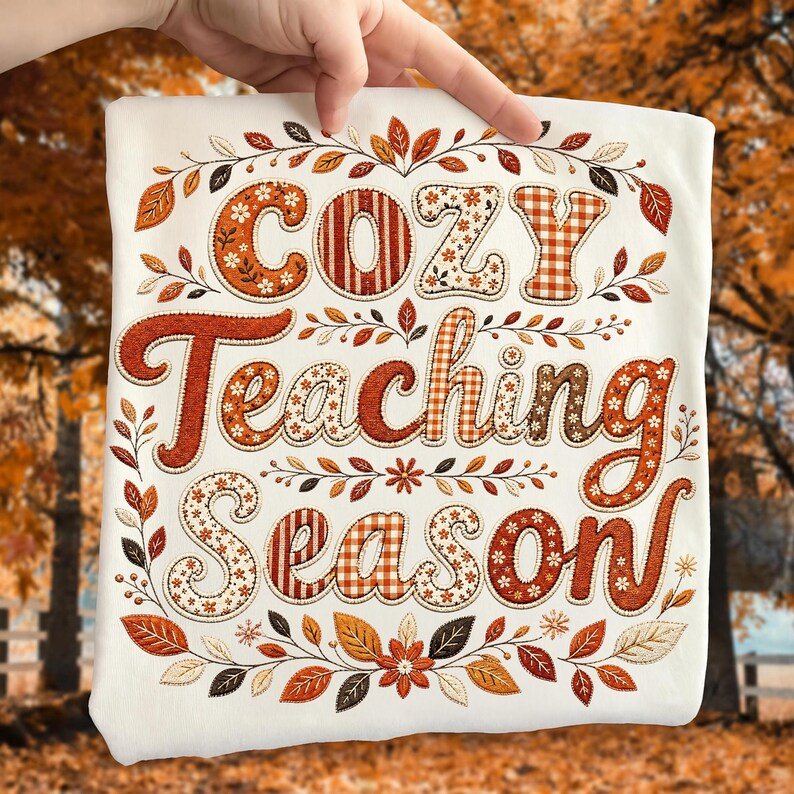 Retro fall-themed Cozy Teaching Season sublimation design on a t-shirt